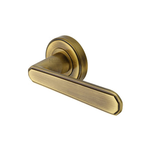 Century Door Handle on Round Rose by M Marcus - Heritage Brass