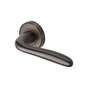 Columbus Door Handle on Round Rose by M Marcus - Heritage Brass