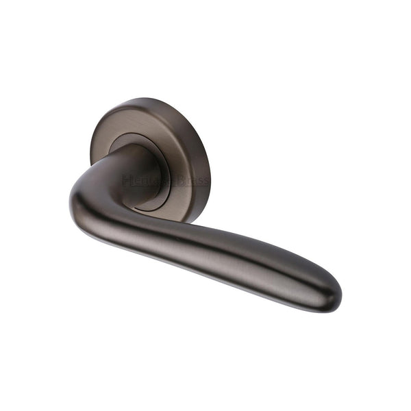 Columbus Door Handle on Round Rose by M Marcus - Heritage Brass