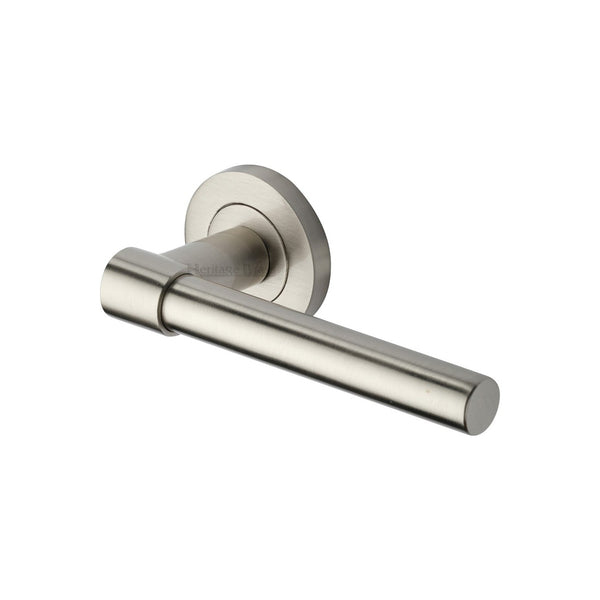 Phoenix Door Handle on Round Rose by M Marcus - Heritage Brass