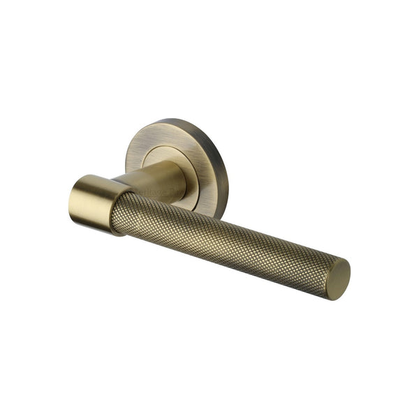 Phoenix Knurled Door Handle on Round Rose - Antique Brass