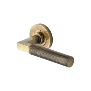 Signac Door Handle on Round Rose by M Marcus - Heritage Brass