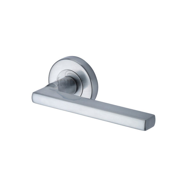 Vector Door Handle on Round Rose by M Marcus - Heritage Brass