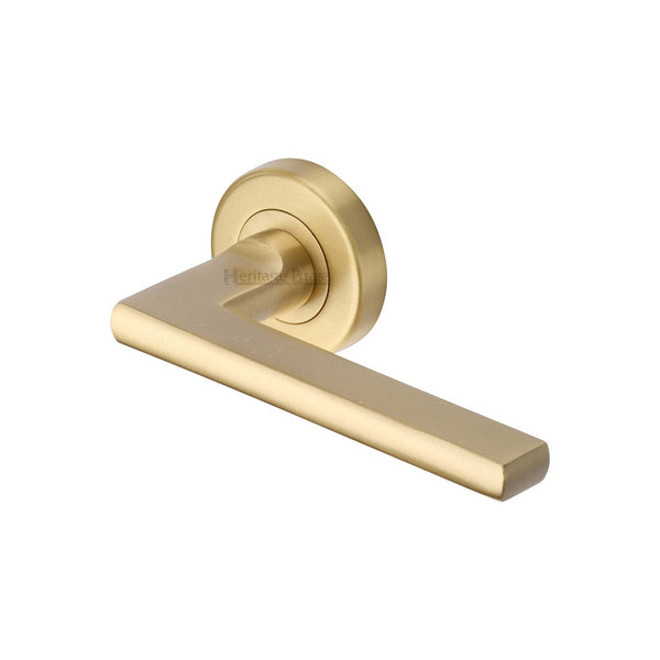 Trident Door Handle on Round Rose by M Marcus - Heritage Brass