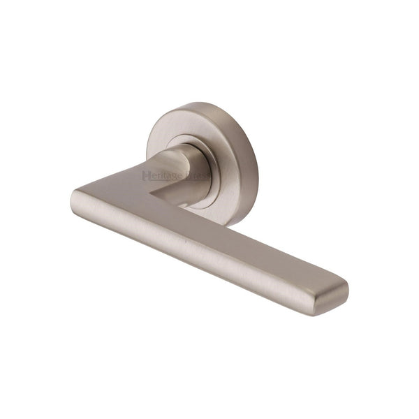 Trident Door Handle on Round Rose by M Marcus - Heritage Brass