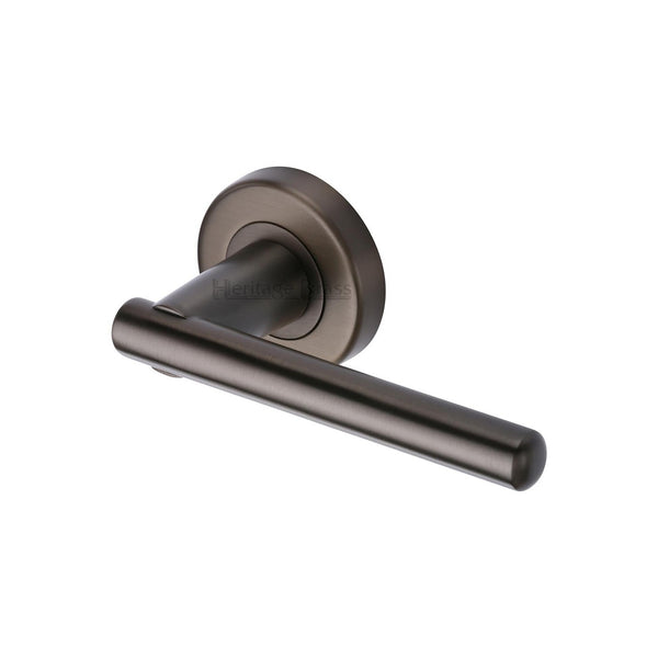 Challenger Door Handle on Round Rose by M Marcus - Heritage Brass