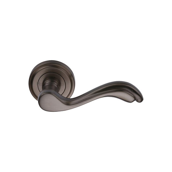 Lisboa Door Handle on Round Rose by M Marcus - Heritage Brass
