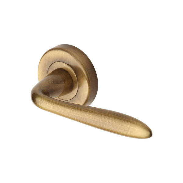 Sutton Door Handle on Round Rose by M Marcus - Heritage Brass