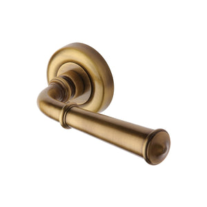 Colonial Door Handle on Round Rose by M Marcus - Heritage Brass
