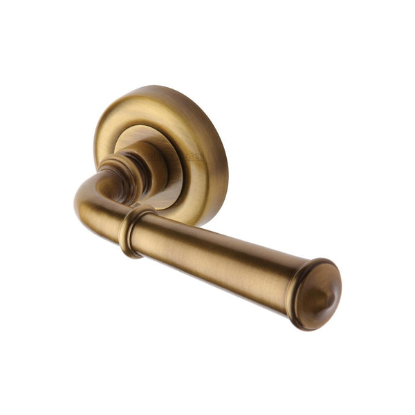 Colonial Door Handle on Round Rose by M Marcus - Heritage Brass
