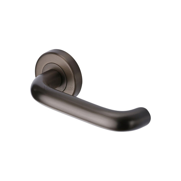 Harmony Door Handle on Round Rose by M Marcus - Heritage Brass
