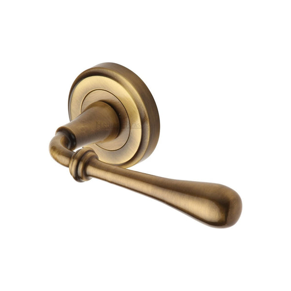 Roma Door Handle on Round Rose by M Marcus - Heritage Brass