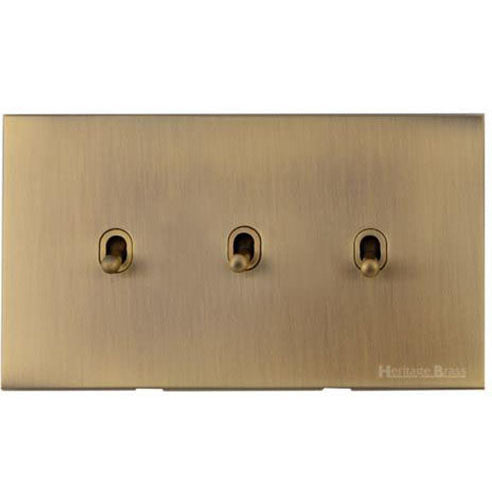 Winchester Range Antique Brass Switches & Sockets, W91 - 3 Gang Stockholm Toggle by Heritage Brass By M-Marcus