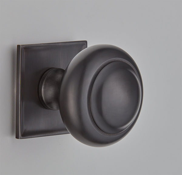 Camber Centre Door Knob on a Concave Square rose-6344SQ